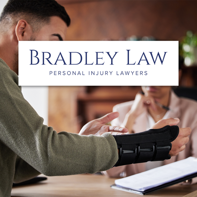 Injured client with wrist brace consulting a lawyer, Bradley Law Personal Injury Lawyers logo overlay