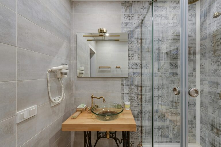The Pros and Cons of the Different Styles of Glass Shower Doors - Window Replacement Center