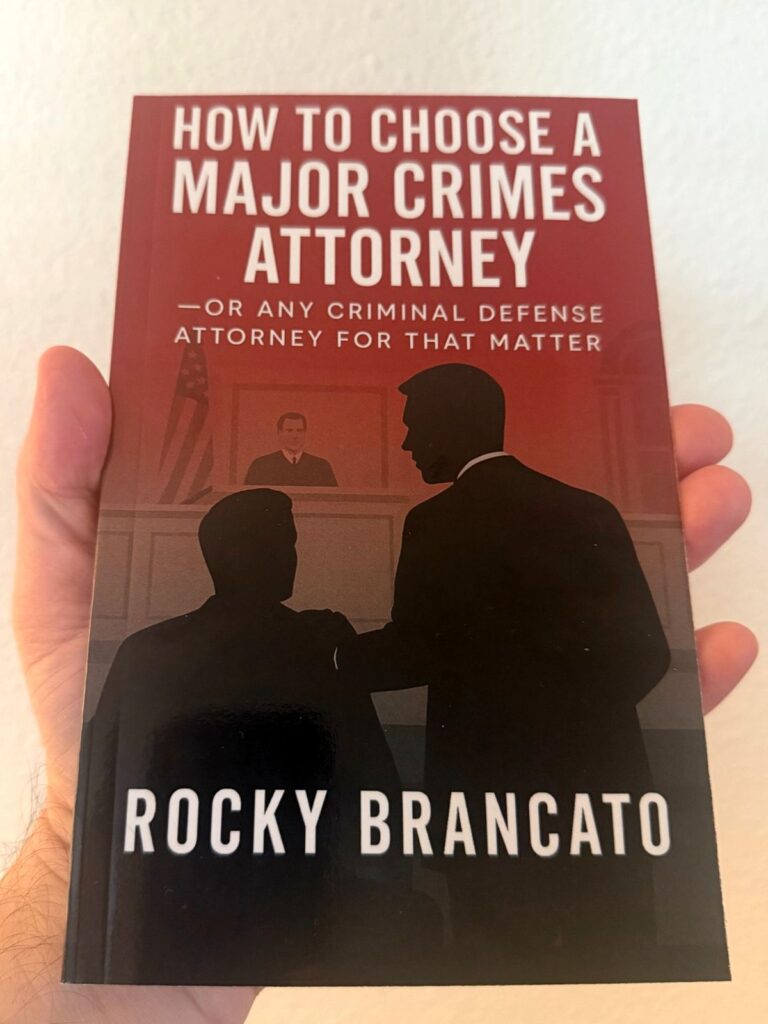 Book cover: How to Choose a Major Crimes Attorney by Rocky Brancato, featuring silhouettes in a courtroom