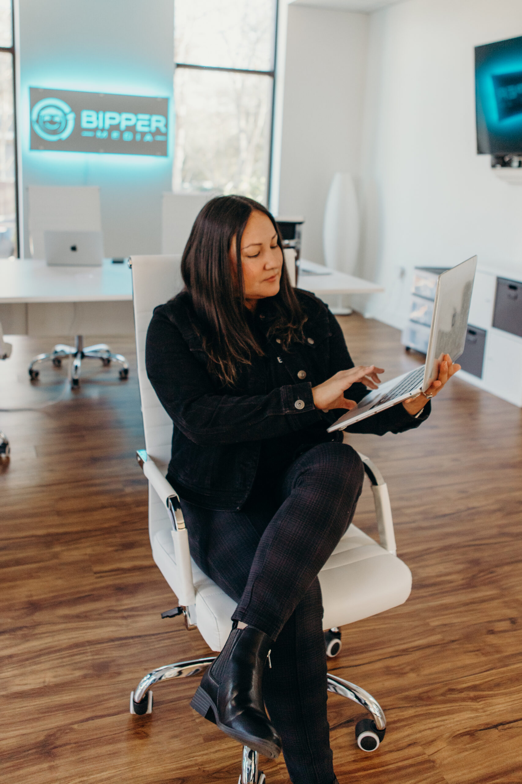 Why Competitors Outrank You With Less 2 Modern office setup with ergonomic chair and computer on a sleek desk.
