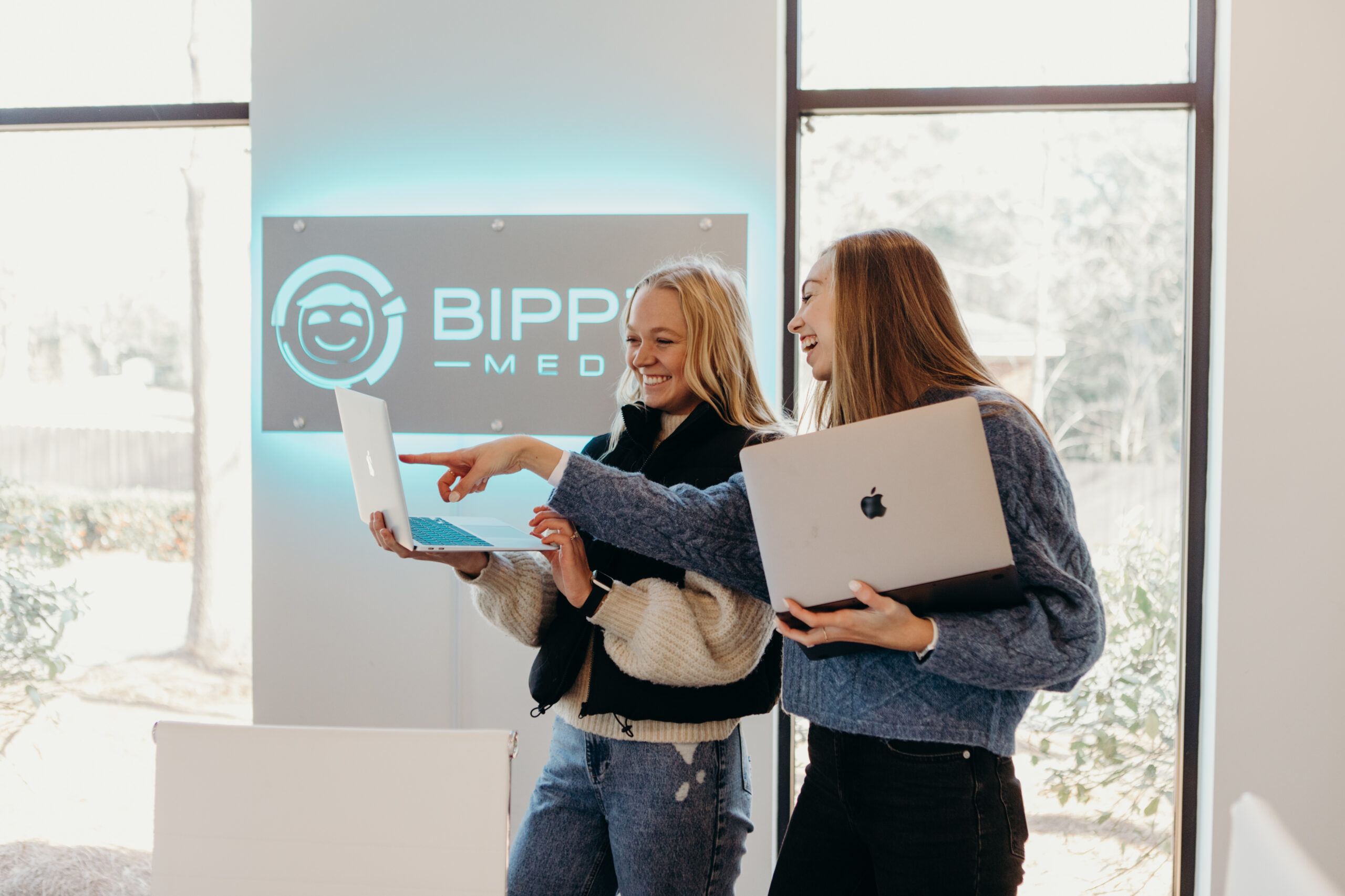 The image showcases a modern office workspace featuring a laptop and various office equipment, symbolizing the digital tools essential for a digital marketing agency like Bipper Media. This setup highlights the importance of technology in enhancing productivity and delivering effective marketing services to clients.